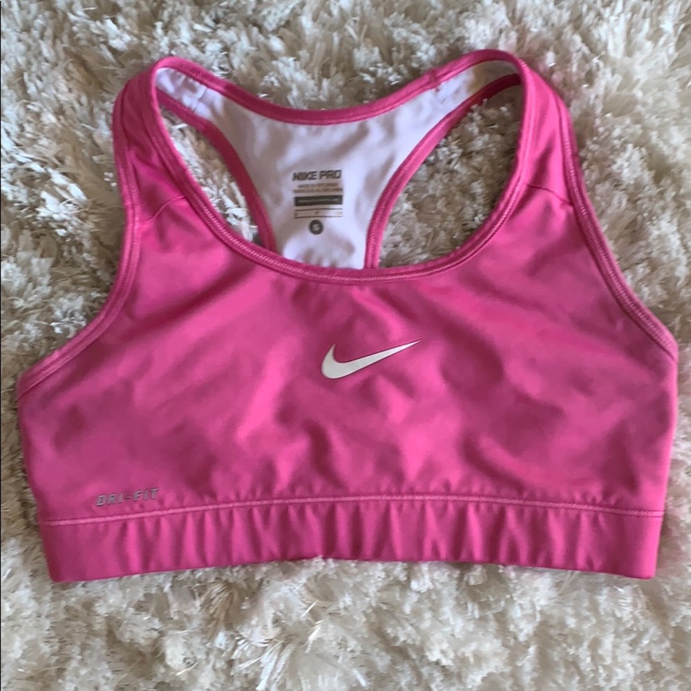 Pink nike pro compression bra size small.